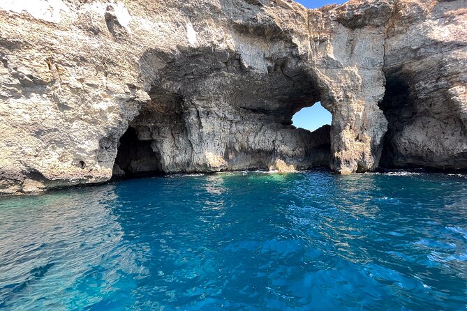 Blue Lagoon Ferry and Caves Tour - Cave sights from the boat: Window Cave, Crystal Lagoon cave, and Bla Saqaf