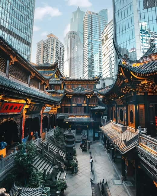 Chongqing: Trendy Spots, Cableway & Ferry Private Tour - Longmenhao Old Street: Restored Steps, Shops, and Tea With a Twist