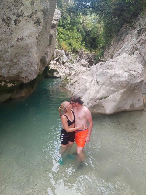 Corfu: Acheron River Trekking Tour with Ferry Trip - Canyon water, drinkable rock flow, and those waterfall payoffs