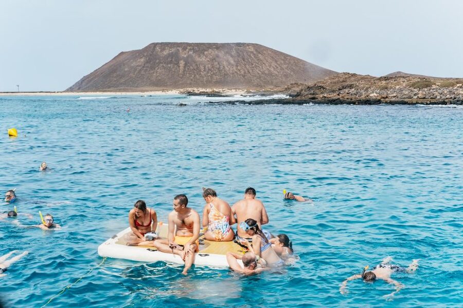 Desde Corralejo: Lobos Island Ferry with Optional Transfer - Snorkeling, Fishing, and the Glass-Bottom Moment