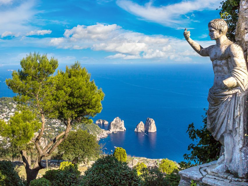 From Naples: Capri Day Trip with Ferry and Island Boat Tour - From Via Galileo Ferraris to the Port: The Start of Your Day