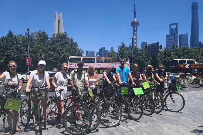 HuangPu River Ferry Boat & Highlights Bike Tour With Local Lunch - Stop 1: The Bund (Wai Tan) for skyline views that set the mood