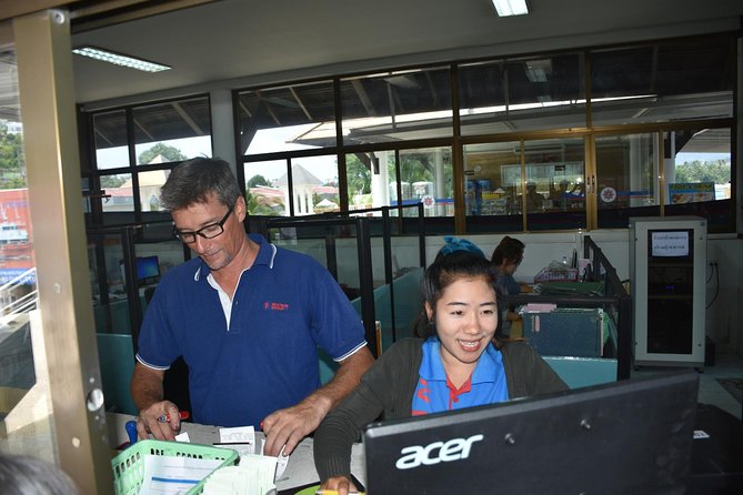 Koh Samui Airport to Koh Phangan by Shared Minivan and Seatran Discovery Ferry - Pickup at Samui Airport: The Samui Accom Counter Detail