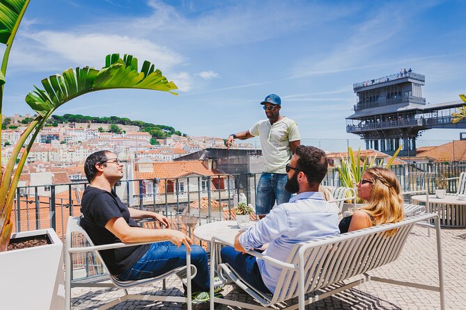 Lisbon Hidden Gems Walk: Traditions, Lunch and Ferry ride - Carmo Convent viewpoint: beer, angles, and the Lisbon skyline puzzle