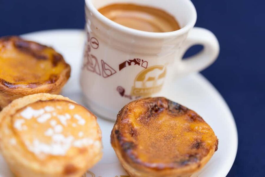 Lisbon Hidden Gems Walk: Traditions, Lunch & Ferry Ride - Coffee and pastel de nata in a quieter bakery stop