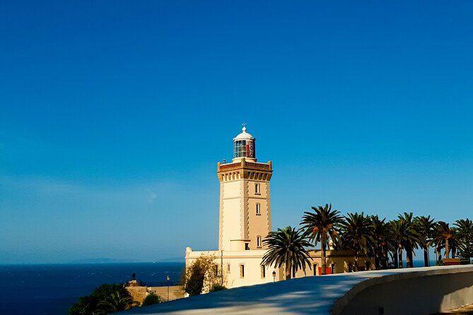 Private Tangier Day Trip from Tarifa with Ferry and Camel Ride - Perdicaris Park and Cap Spartel: Rif mountains, sea cliffs, and lighthouse views