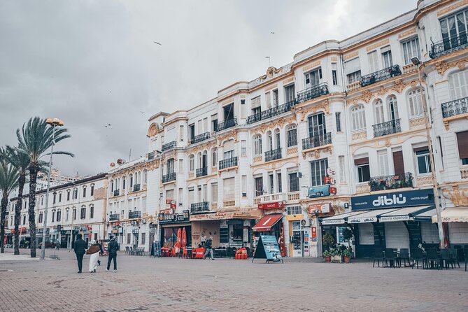 Private Tangier Day Trip from Tarifa with Ferry and Camel Ride - Tangier Casbah area: Grand Mosque, Kasbah streets, and palace-style views