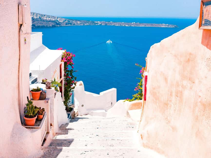 Santorini Guided Day Trip From Crete with Ferry Tickets - Fira: the island capital, caldera views, and your best coffee break