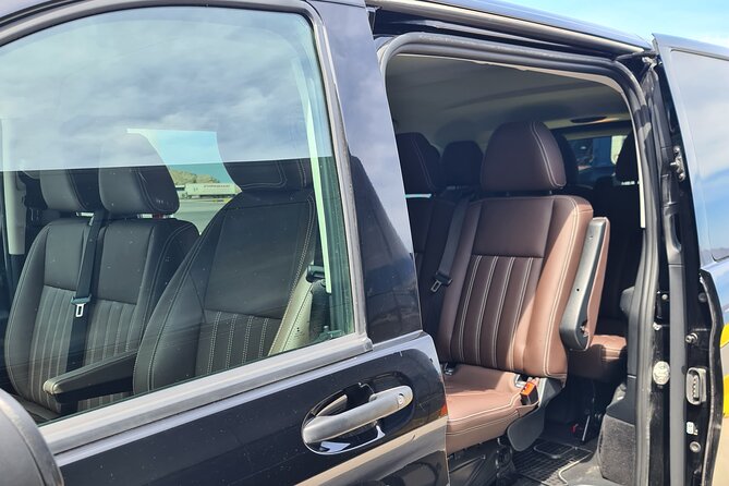 Santorini Private Transfers | Any Pick-Up to Any Destination - Athinios ferry port pickup: find your driver without playing detective