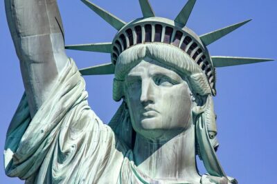 Statue of Liberty & Ellis Island Guided Tour with Ferry Transfers - Liberty Island on the first ferry: the Statue from several angles