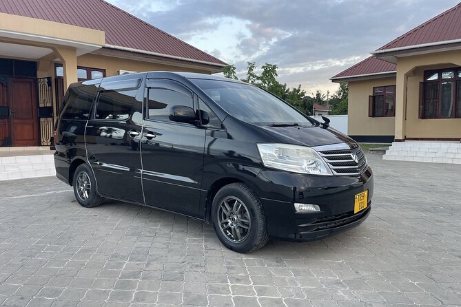 Transport Dar es Salaam Airport Port, Ferry or Train to Hotel - Your ride: the Toyota Alphard setup and what it feels like in practice