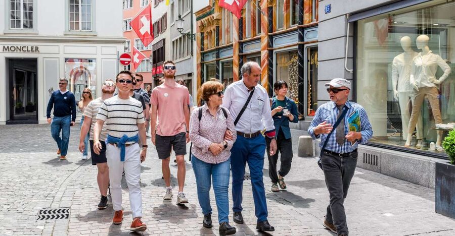 Zurich: City Highlights Tour by Bus, Cable Car, and Ferry - Old Town Walking: St. Peter’s Church and the Real Center of Zurich